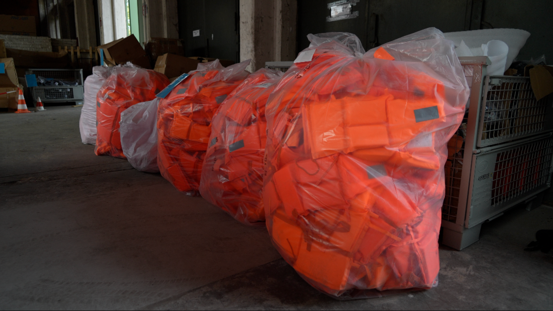 Inside Germany's hidden warehouse housing thousands of life‑jackets and smuggling boats