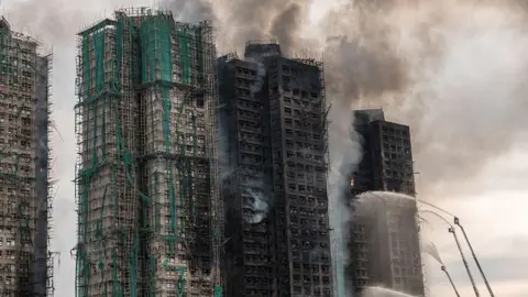 Devastation in Hong Kong: Questions Arise Following Catastrophic Fire