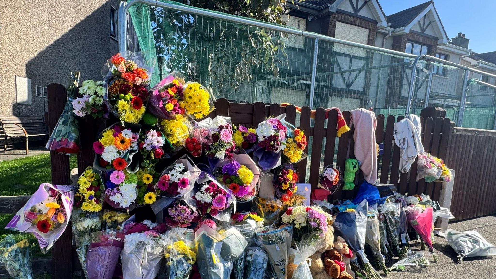 Flowers left at the waterford arson site