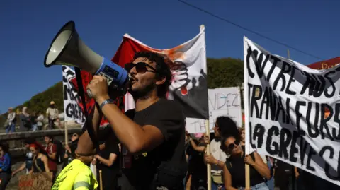 Widespread Strikes Erupt in France Amid Budget Cut Protests