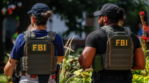 FBI Dismisses Agents Shown Kneeling at George Floyd Protest