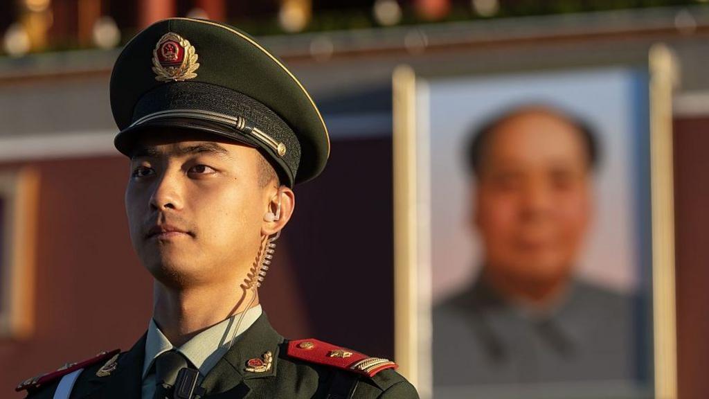 Soldier stands guard in Tiananmen Square