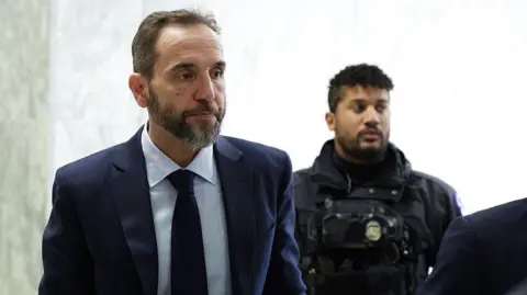 Smith Stands Firm on Trump Investigations During Congressional Testimony