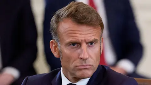 Macron Faces Urgent Call to Appoint New Prime Minister Amid Looming Protests in France