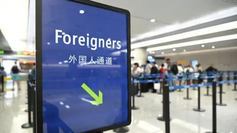 China's New Tech Visa Ignites Controversy in India and Beyond