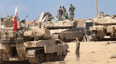 Escalation in Gaza: Israeli Tanks Advance into Sheikh Radwan District