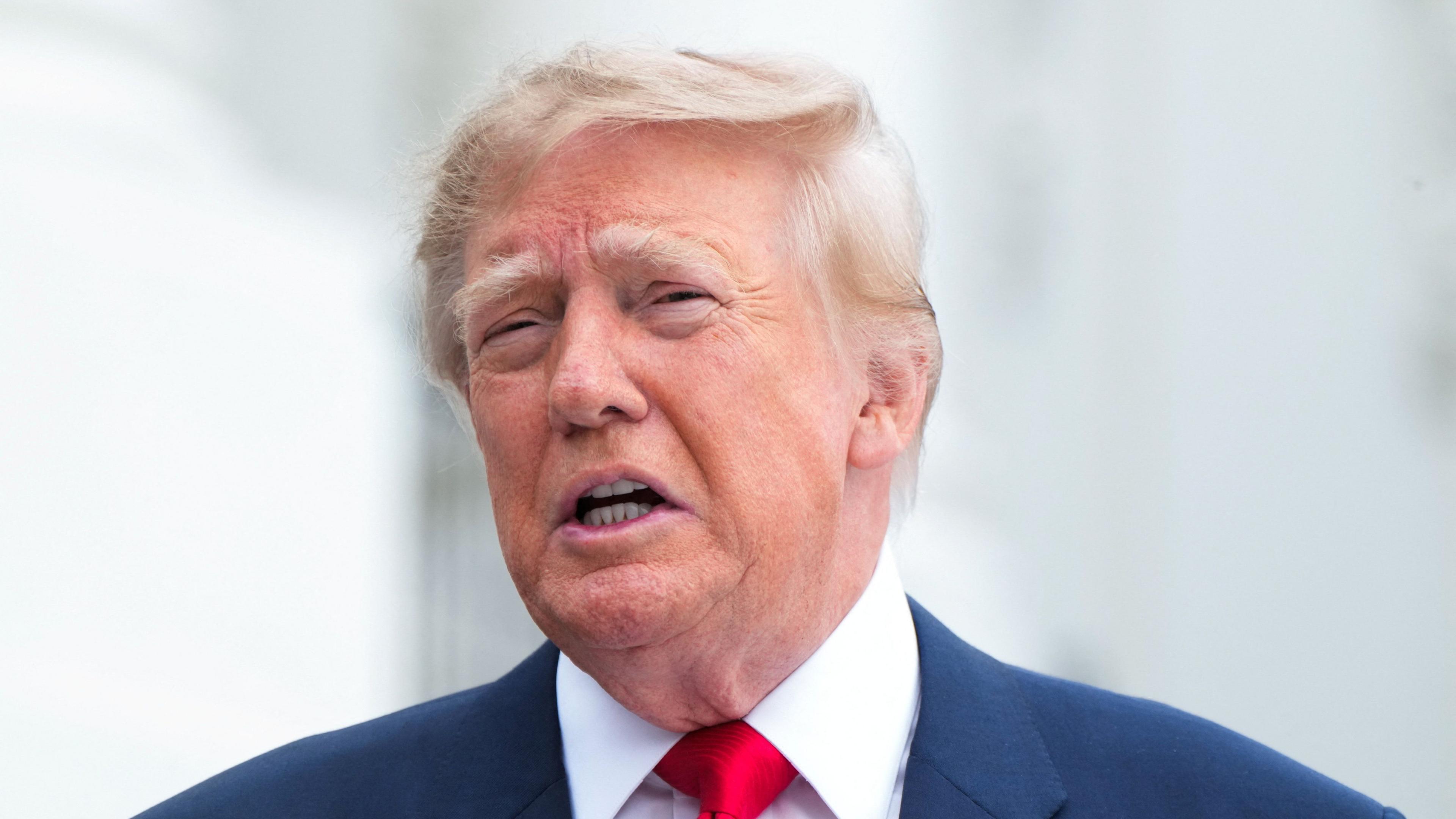 Justice Department probes TV networks after Trump pool boycott