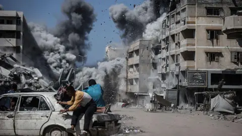 Escalating Violence: Israeli Strikes Claim Lives of Civilians in Gaza Amid Humanitarian Crisis