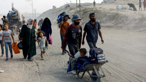 Desperate Exodus: Palestinians Flee Gaza City Amid Intensified Israeli Offensive