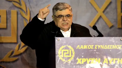 Controversy Erupts as Neo-Nazi Leader Nikos Michaloliakos Released Early from Prison