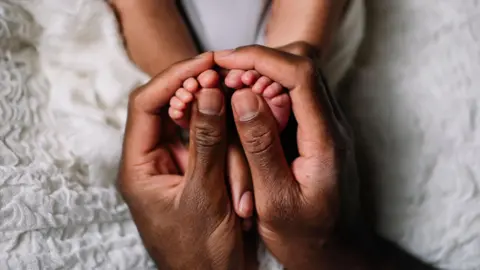 South Africa's Constitutional Court Grants Equal Parental Leave Rights for Fathers