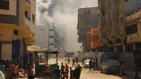 Israeli Forces Escalate Bombardment of Gaza City, Displacing Civilians