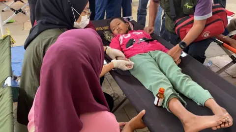 Indonesian Free School Lunch Program Faces Crisis as Over 1,000 Children Fall Ill