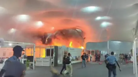 Fire Erupts at COP30 Climate Talks, Evacuating Attendees