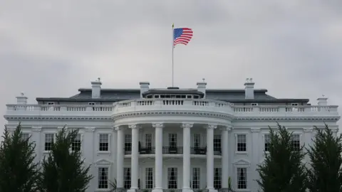 White House Warns of Potential Mass Firings Amid Looming Government Shutdown