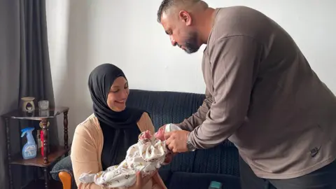 Iraqi Asylum Family Finds Relief After Tragedy: New Baby, New Hope
