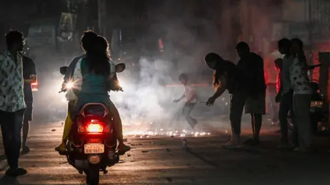 Vibrant Diwali Festivities Light Up India Amid Pollution Concerns